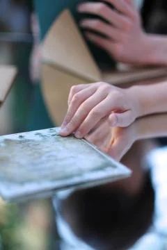 Hands and their reflections in different planes of the mirror surface Stock Photos