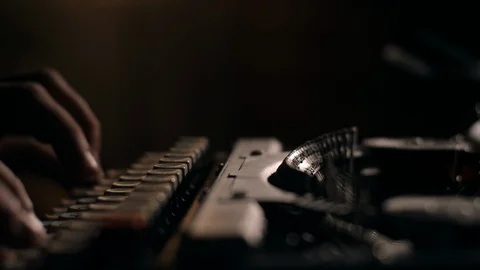 Hands and typebars on a dusty vintage typewriter in slow motion Stock Footage 97762839