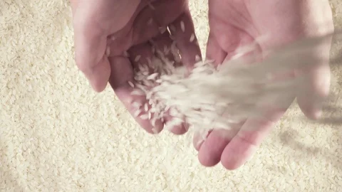 Hands and white long grain rice Stock Footage 92088137