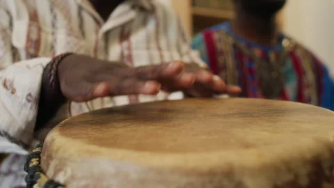 Hands of Anonymous Black Man Playing African Drum Honouring Kwanzaa Traditions Stock Footage 319889321