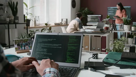 Hands of Anonymous Developer Coding on Laptop at IT Company Stock Footage 285711086