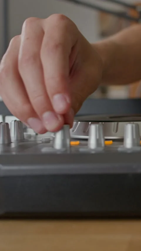 Hands of Anonymous Young Man Connecting Cable, Adjusting Knobs on DJ Mixer 스톡 동영상 314661274