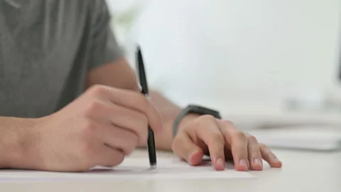 Hands of Anxious Man Tying to Write on Paper, Close Up Stock Footage 146484838