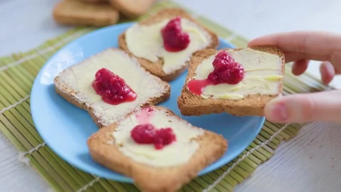 A hands-on approach to preparing a healthy breakfast is shown Stock Footage 232341022