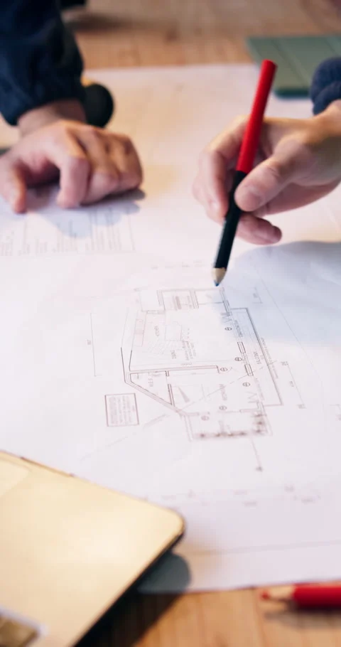 Hands, architect and blueprint with teamwork for drawing, civil engineering and Stock Footage 340905714