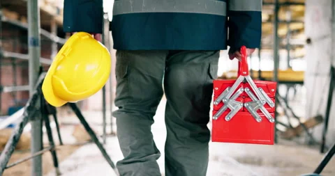 Hands, architect or walking with helmet or toolbox on construction site for Stock Footage 337035310