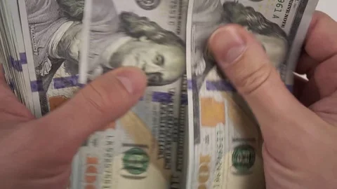 Hands are counting 100 Dollar Bills Close-up Stock Footage 73831388