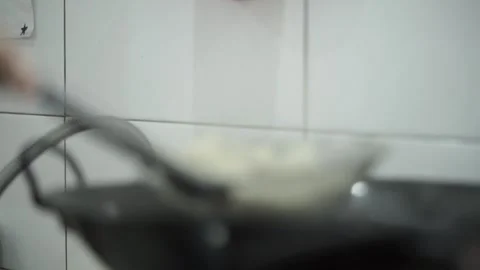 Hands are draining dumplings Stock Footage 261247893