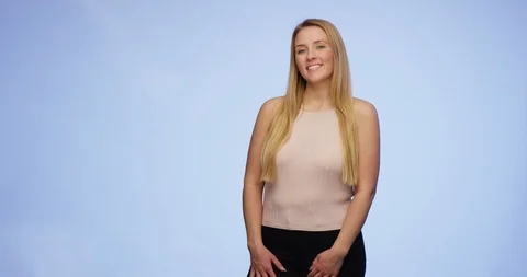 Hands are giving an oversized blank Card to a stunning smiling young lady Stock Footage 87752276