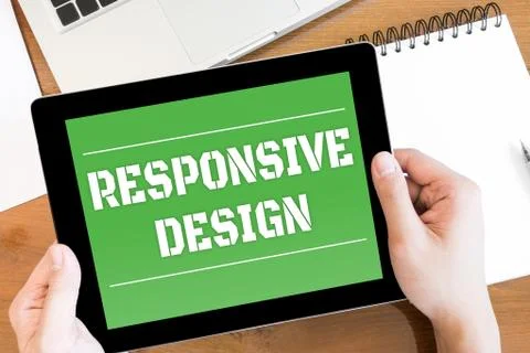 Hands are holding a tablet with "RESPONSIVE DESIGN" text on the screen. Top v Stock Photos