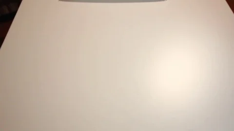 Hands are pulling the box full of assorted sushi close to the camera Stock Footage 70780687