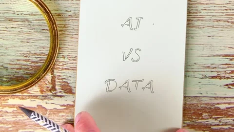 Hands are shown drawing and writing different concepts related to AI and data on Stock Footage 336841066
