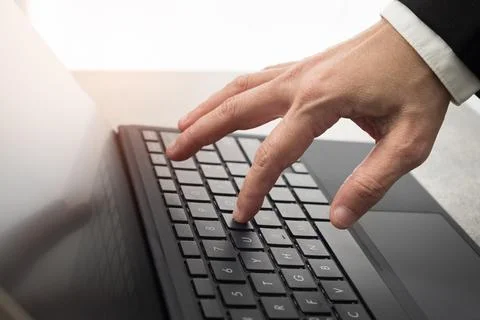 Hands are typing on the computer keyboard. Stock Photos