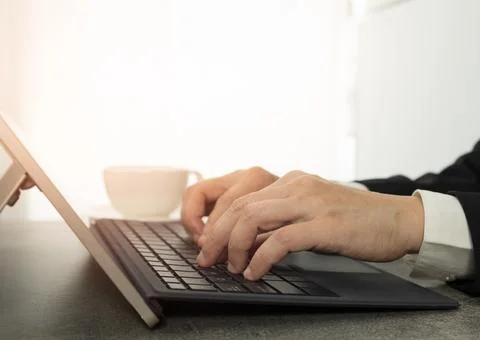 Hands are typing on the computer keyboard. Foto stock