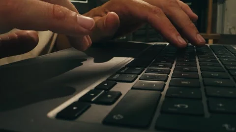 Hands are Typing on a Laptop Keyboard with Focus and Engagement in a Modern Stock Footage 281022287