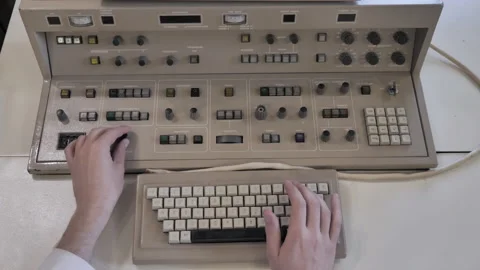 Hands are typing on old style keyboard and Adjust Control Panel Board Stock Footage 157993913