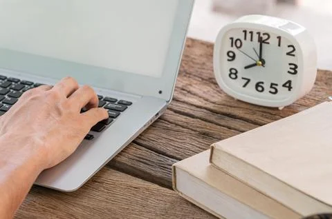 Hands are using a notebook computer. Stock Photos