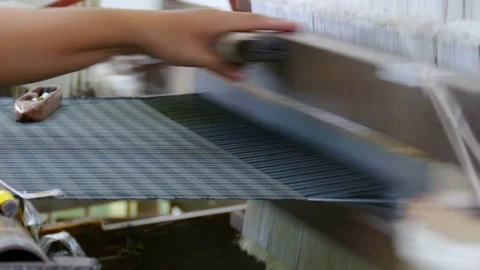 Hands are weaving silk Stock Footage 73104036