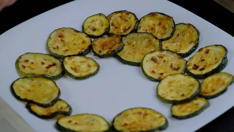 Hands Arranging Grilled Squash Slices on Plate Cooking Stock Footage 341462222