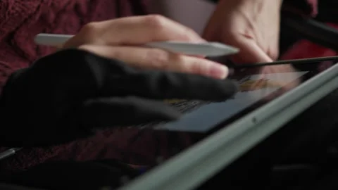 Hands of an artist using tablet and stylus to draw painting Stock Footage 268731211