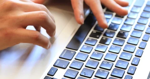 Hands of Asian young man typing on keyboard of  laptop Stock Footage 90272724