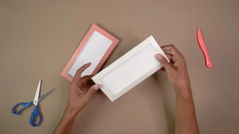 Hands Assembling Cardstock Craft With Scissors and Folding Tool on Tabletop Vídeos de archivo 345617096