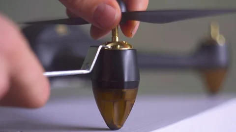 Hands assembling a copter, drone. Hobby and technology in every day life. Stock Footage 105028181