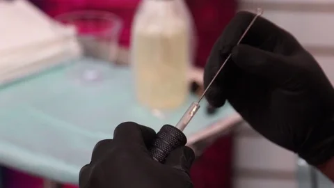 Hands assembling tattoo gun testing close up. Stock Footage 71116209