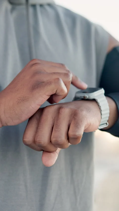 Hands, athlete and scroll on smart watch outdoor for fitness app, check running Stock Footage 327362706