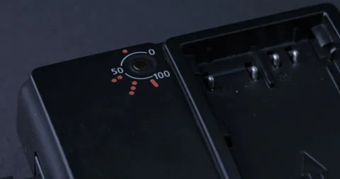 Hands attach battery to charger Stock Footage 126920144