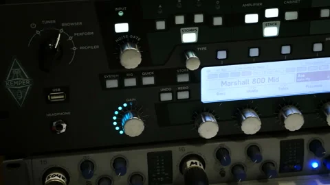 Hands of Audio engineer working on a professional analog console, moving fade Stock Footage 88137490