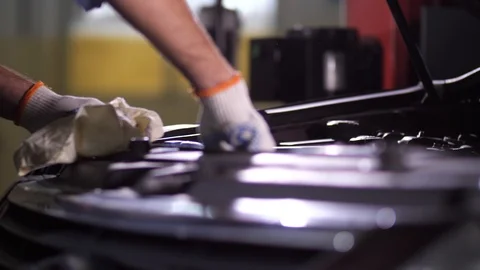 Hands of auto mechanic checking engine oil level 스톡 동영상 123503897