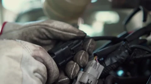 Hands of auto mechanic doing car service and maintenance Stock Footage 155948174