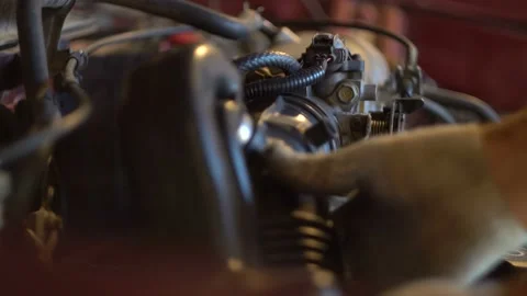 Hands auto mechanic remove the air duct in the engine. Close-up 4K Stock Footage 122263551