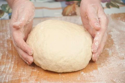 Hands baking dough with rolling pin Stock Photos