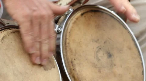 Hands Banging Bongo Drums Stock Footage