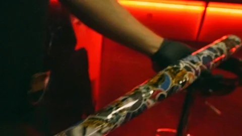 Hands with bat in dark interiour cafe Stock Footage 115699378