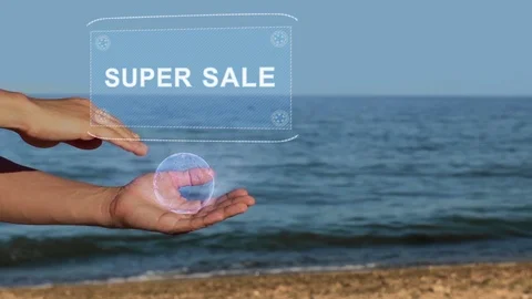 Hands on beach hold hologram text Super sale Stock Footage 107130948