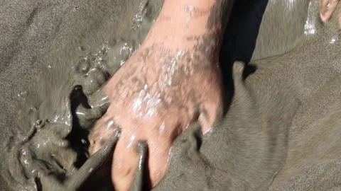 Hands in Beach Sand Stock Footage 149777093