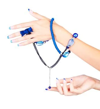 Hands with beads Stock Photos