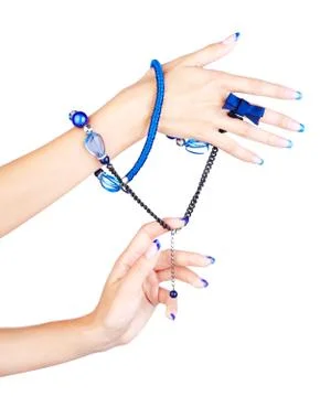 Hands with beads Stock Photos