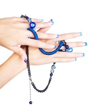 Hands with beads Stock Photos