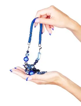 Hands with beads Stock Photos