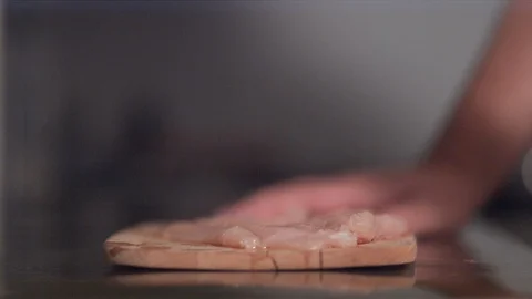 Hands beating meat with a mallet Stock Footage 86465740