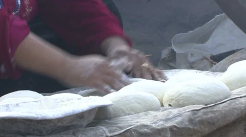 Hands of a beduin woman preparing arabic bread_Archive footage_2012 Stock Footage 39914262