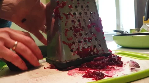 Hands of beets grate Stock Footage 86307090