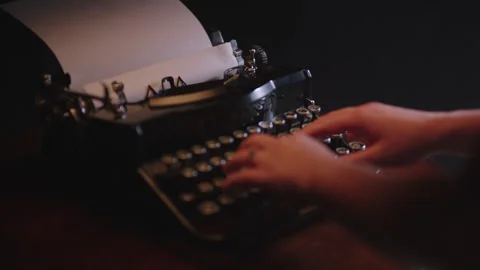 Hands Being Placed on a Typewriter Stock Footage 156535565