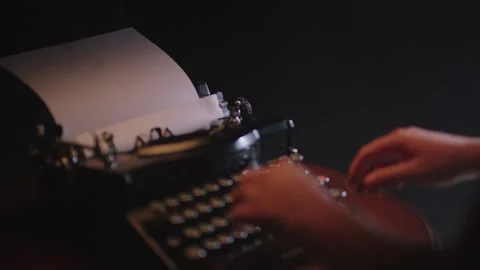 Hands Being Placed on a Typewriter Stock Footage 156535781