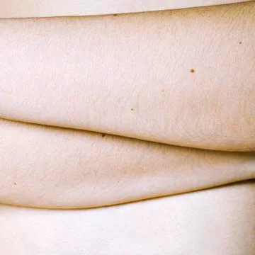 Hands on a belly Stock Photos