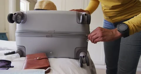 Hands of biracial woman zipping Stock Video Pond5 - Main Image